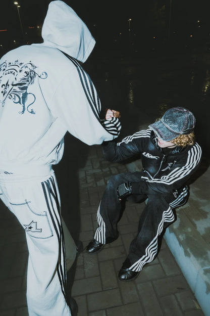 LUKAMACHAIN STRIPED JOGGERS WHITE